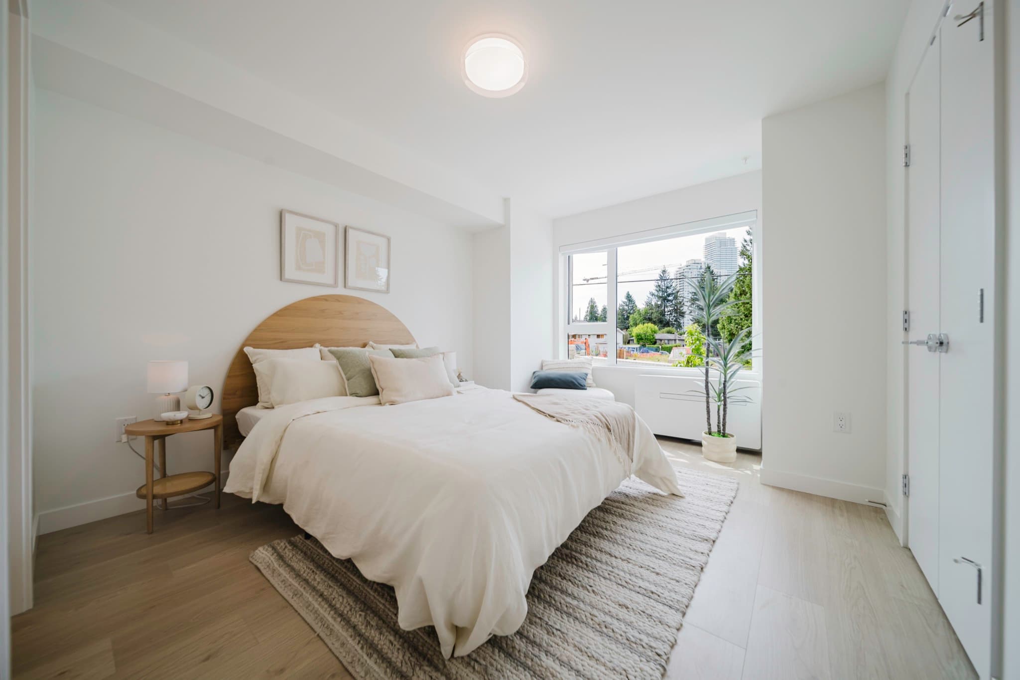The open-plan kitchen and living space in a finished Botanica display townhome